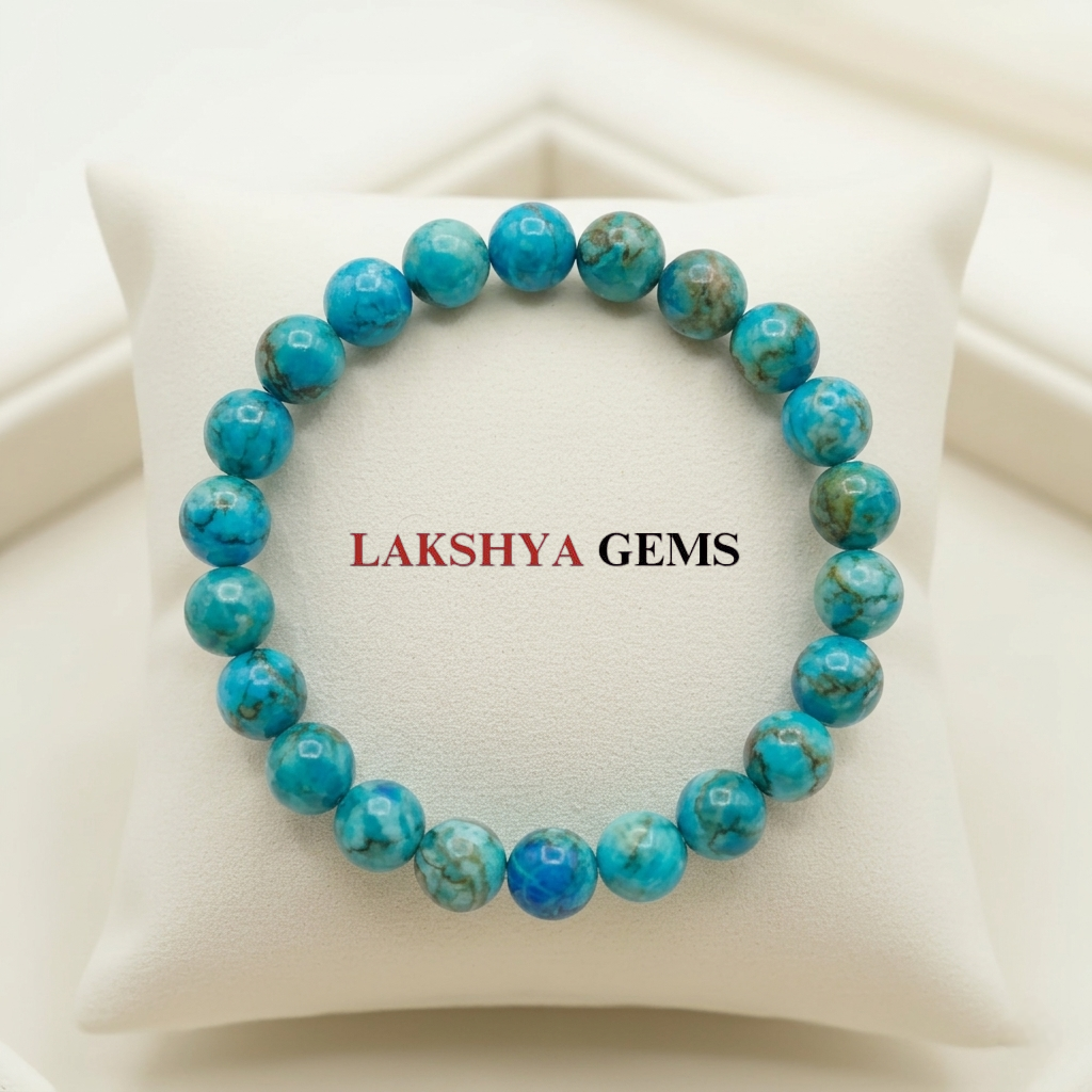 Natural Turquoise beaded bracelet featuring vibrant blue hues and unique dark matrix patterns from Lakshya Gems