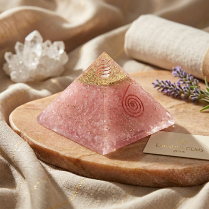 Natural Rose Quartz crystal pyramid with a soft translucent pink color and smooth polished facets lakshya gems mumbai
