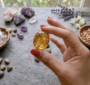 A collection of polished Citrine crystal tumbles featuring transparent honey-yellow and golden-amber colors.