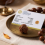 Authentic 3 Mukhi Nepali Rudraksha bead with three distinct natural grooves and a rich dark brown finish from lakshya gems mumbai