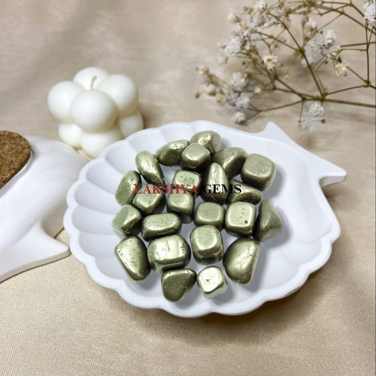 High-luster Pyrite tumble stones with a metallic gold finish for wealth and abundance.