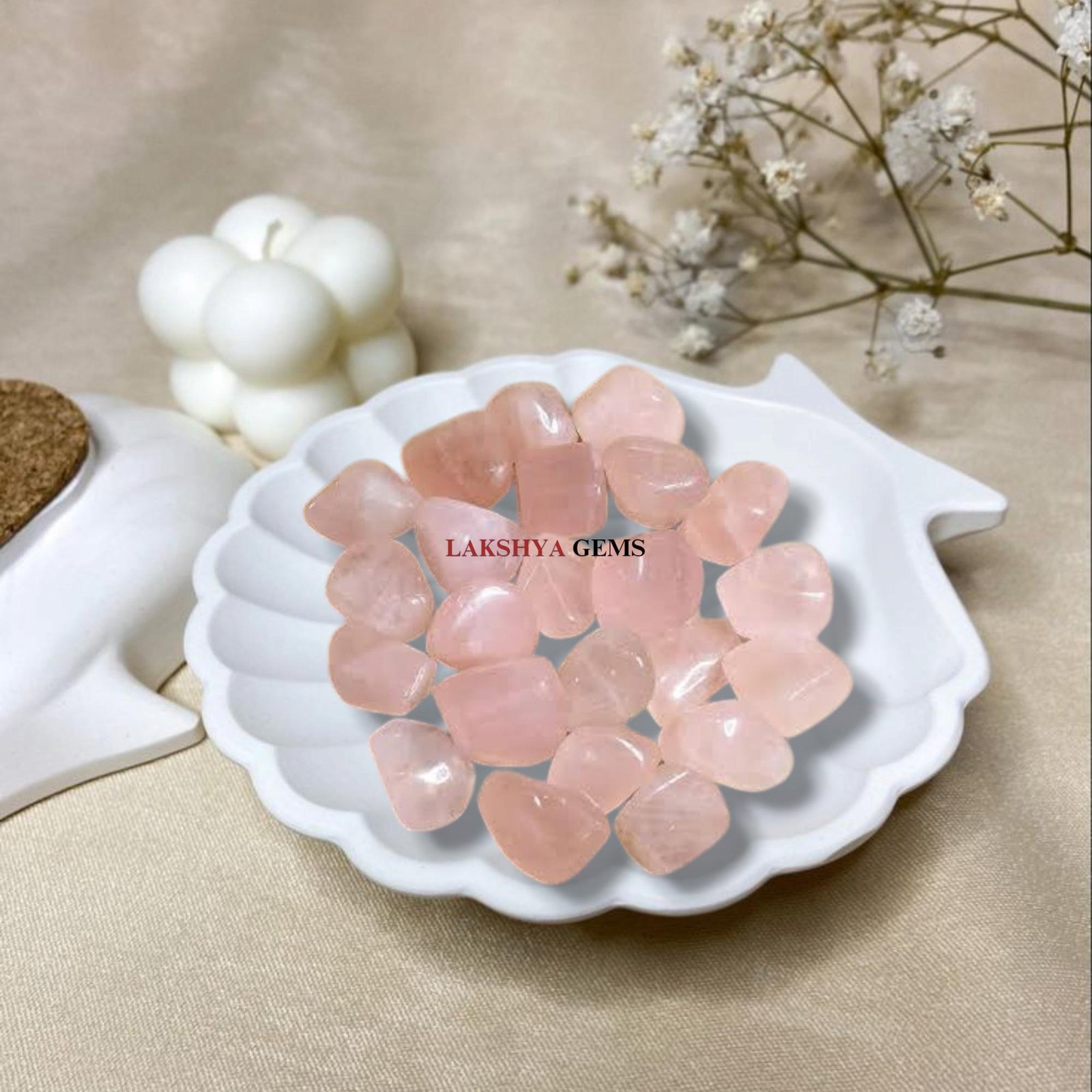 Group of polished Rose Quartz tumble stones in a soft translucent pink for love and healing from lakshya gems mumbai