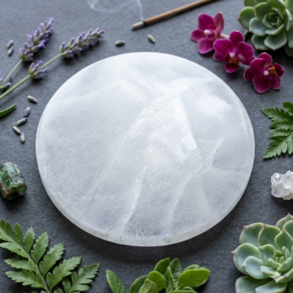 A 6-inch round polished Selenite charging plate showing a pearly white translucent surface from lakshya gems