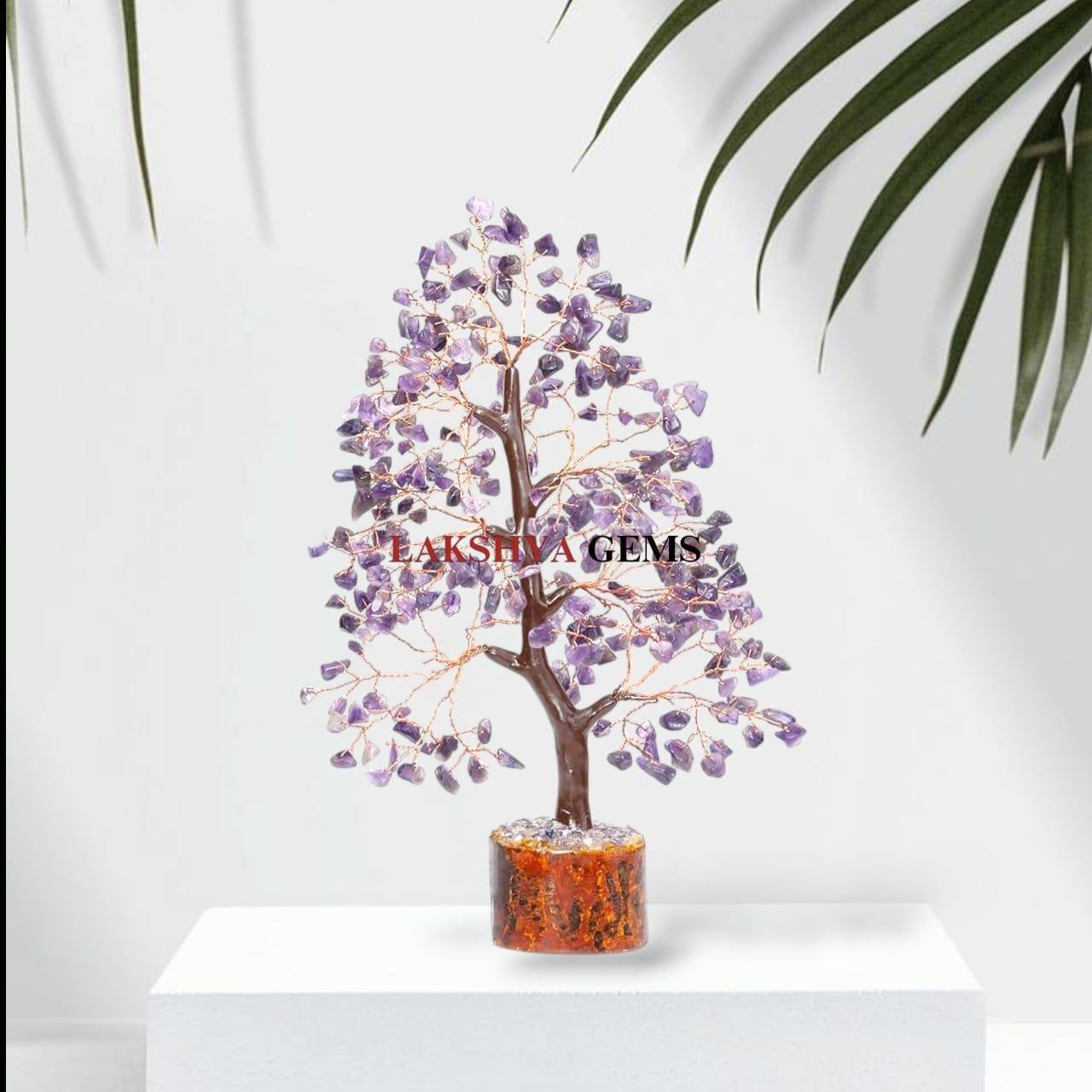 Amethyst gemstone tree with 300 polished chips on a golden wire trunk for home peace.