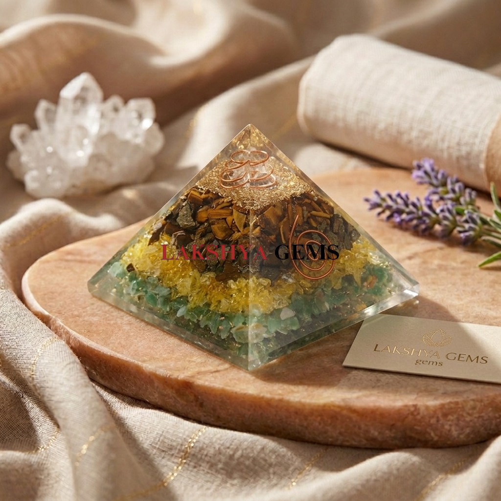 Money Magnet Orgone Pyramid with layers of Pyrite, Citrine, Green Aventurine, and Tiger Eye crystals. from lakshya gem mumbai