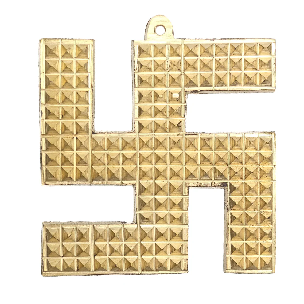 Panchdhatu Pyramid Swastik made of five sacred metals for Vastu protection and prosperity.