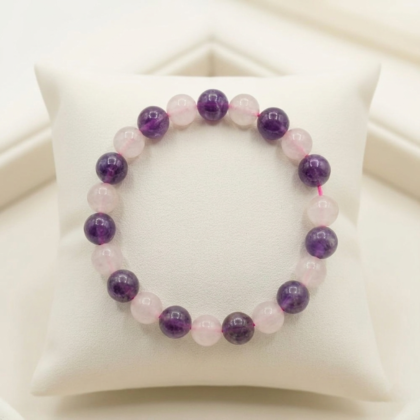Handcrafted Inner Peace healing Bracelet featuring natural purple Amethyst and soft pink Rose Quartz beads.