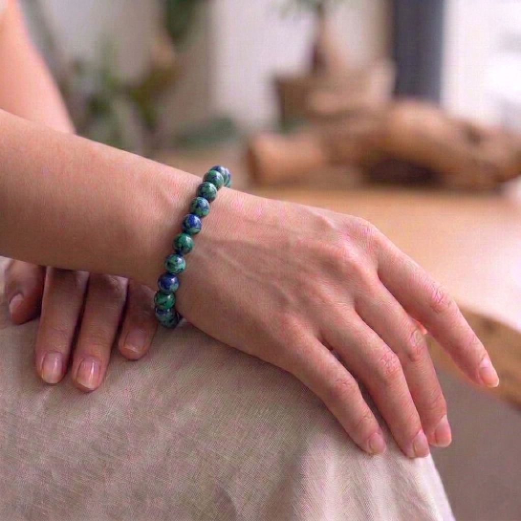 A premium Azurite crystal bead bracelet featuring deep, midnight-blue natural stones with a smooth polished finish.