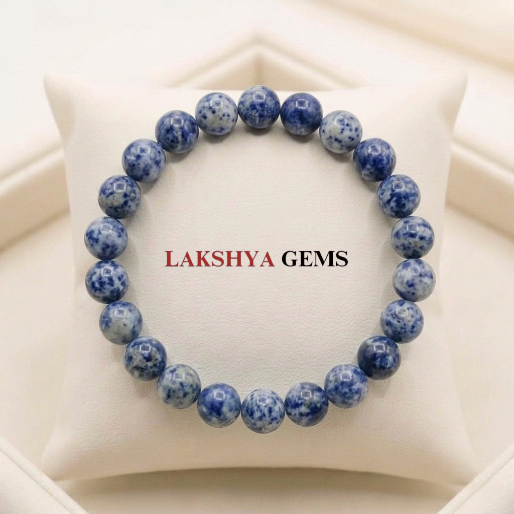 Natural Sodalite crystal bracelet featuring polished indigo-blue beads with white calcite veining from lakshya gems