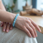 Natural Aquamarine beaded bracelet featuring translucent sea-foam blue gemstone beads lakshya gems