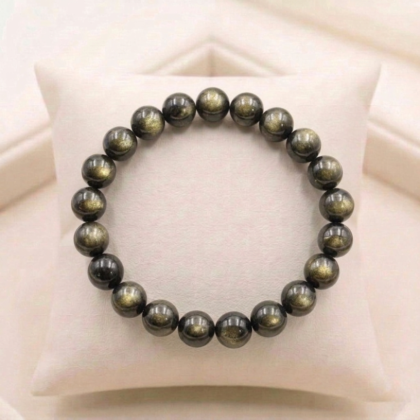 Natural Black Obsidian beaded bracelet with a high-gloss, jet-black volcanic glass finish from lakshya gems