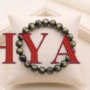 Natural Black Obsidian beaded bracelet with a high-gloss, jet-black volcanic glass finish from lakshya gems