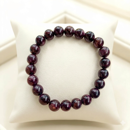 Lakshya Gems handcrafted Garnet bracelet with polished, deep-red natural gemstone beads.