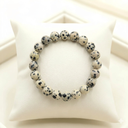 Natural Dalmatian Jasper beaded bracelet with creamy white base and distinct black spotted patterns from lakshya gems