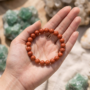 Natural Red Jasper beaded bracelet featuring a deep brick-red color and a smooth polished finish from lakshya gems