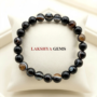 Authentic Sulemani Hakik bracelet featuring naturally banded black, gray, and white gemstone beads from lakshya gems