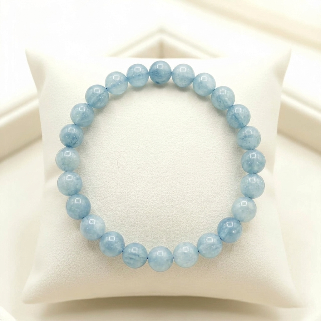 Aquamarine bracelet featuring translucent sea-foam blue gemstone beads lakshya gems