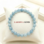 Natural Aquamarine beaded bracelet featuring translucent sea-foam blue gemstone beads lakshya gems