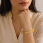 A high-quality Yellow Aventurine crystal bead bracelet showing a warm golden-yellow color and smooth polished finish.