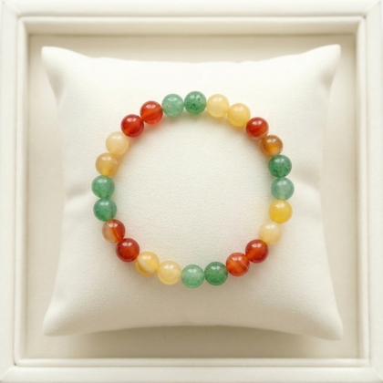 A Career Success crystal bracelet featuring a pattern of yellow, orange, and green natural gemstone beads.