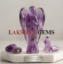 A hand-carved natural Amethyst crystal angel featuring deep purple hues and translucent polished finish.