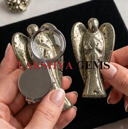 A hand-carved natural Pyrite crystal angel featuring a brilliant metallic gold luster and polished finish.