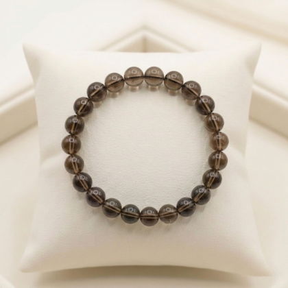 Authentic Smoky quartz bracelet with natural translucent smoky brown quartz beads for root chakra grounding and emf protection from Lakshya Gems