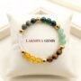 best mumbai DhanYog Wealth Bracelet featuring natural Citrine, metallic Pyrite, Green Jade, and Green Aventurine beads. lakshya gems