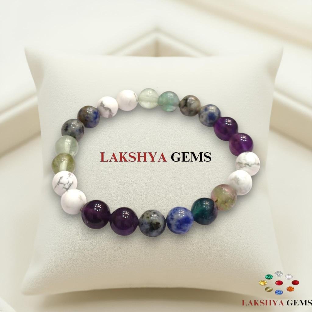 Education bracelet featuring purple Amethyst, green and purple Multi-Fluorite, blue Sodalite, and white marble Howlite beads -Lakshya Gems