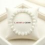 Natural Selenite beaded bracelet with a pearly white translucent luster for energy cleansing from lakshya gems