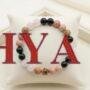 Handcrafted Love and Relationship Bracelet featuring natural Rose Quartz and pink-black Rhodonite beads from lakshya gems