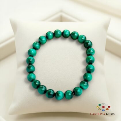 Natural Malachite beaded bracelet with vibrant green swirling patterns and high-gloss finish.