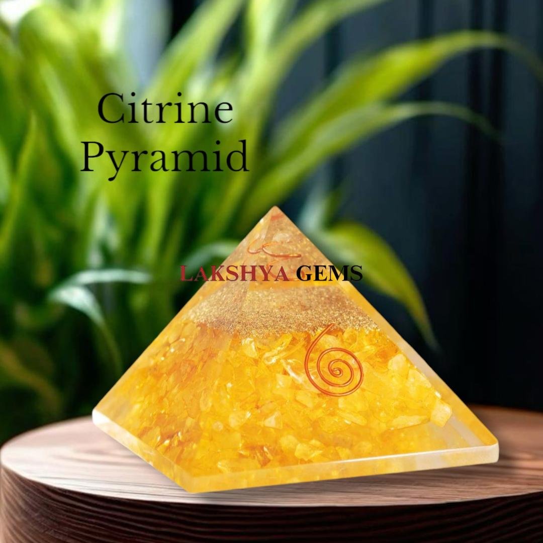 Polished natural Citrine pyramid with a transparent golden yellow hue for wealth manifestation.