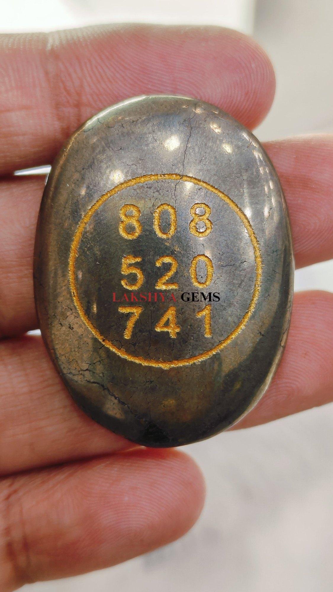 Golden Pyrite Zibu Coin engraved with sacred angelic symbols and the wealth numbers 808 520 741.