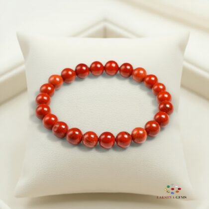 Natural Red Jasper beaded bracelet with deep brick-red opaque stones for grounding and strength.
