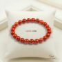 Natural Red Jasper beaded bracelet with deep brick-red opaque stones for grounding and strength.
