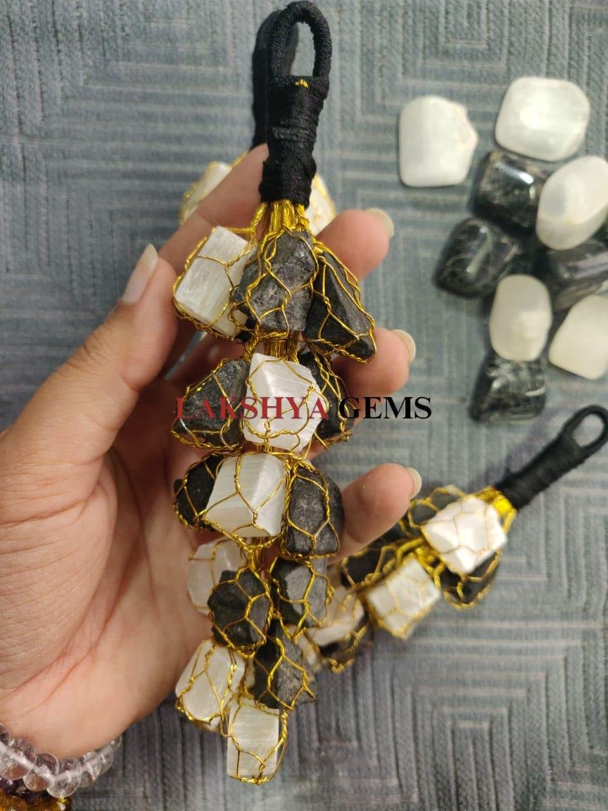 Black Tourmaline and Selenite crystal hanger for home protection and energy clearing.