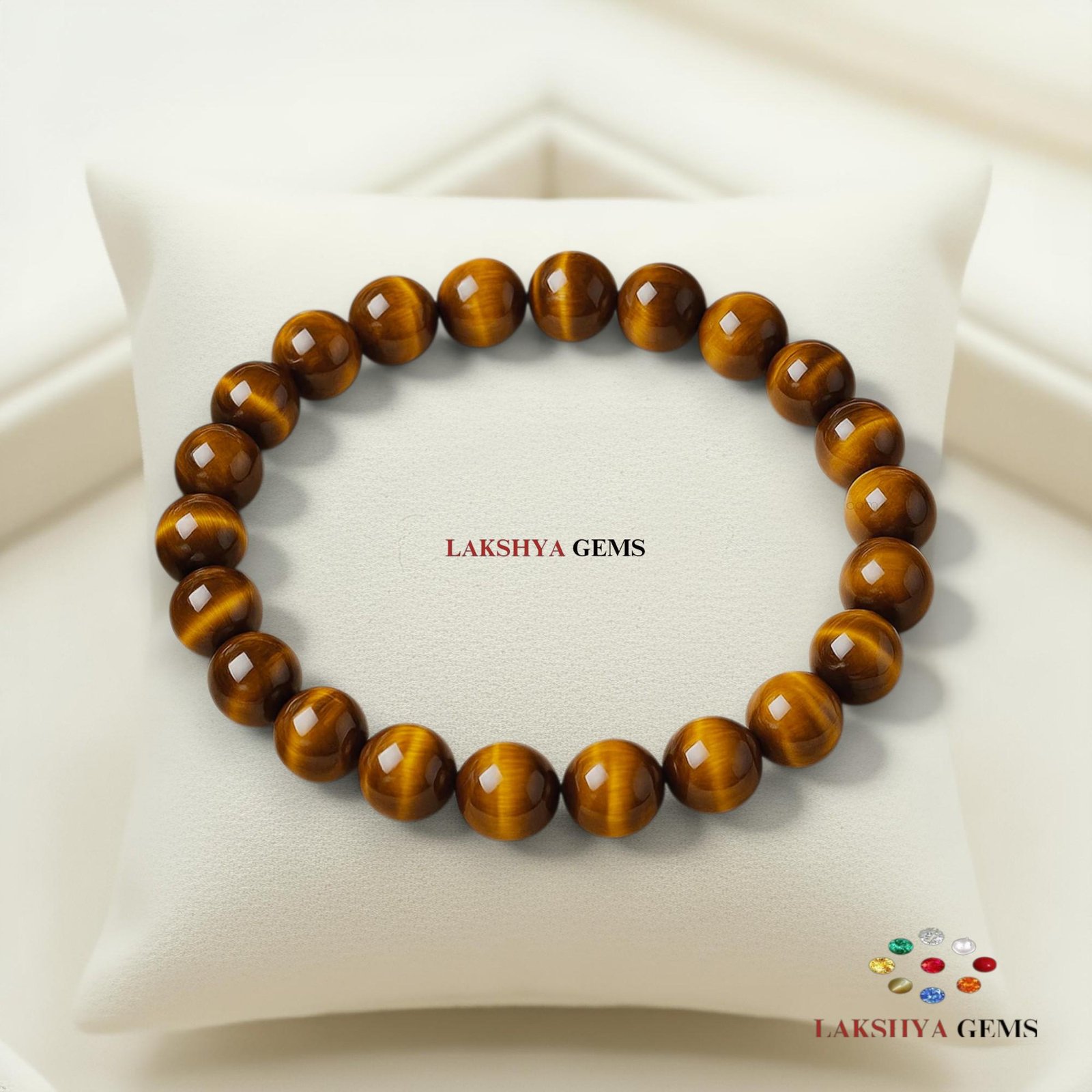 A high-quality Tiger Eye crystal bead bracelet showing vibrant golden-yellow chatoyant bands on a white background.