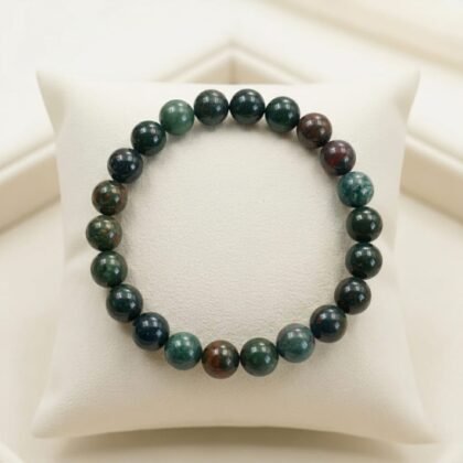 Natural Bloodstone crystal bracelet featuring polished forest-green beads with red jasper inclusions.