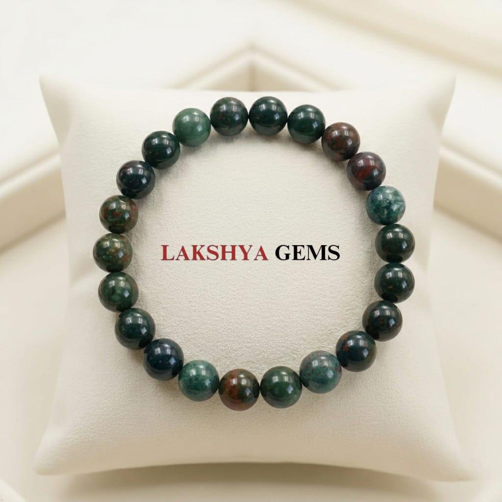 Natural Bloodstone crystal bracelet featuring polished forest-green beads with red jasper inclusions.