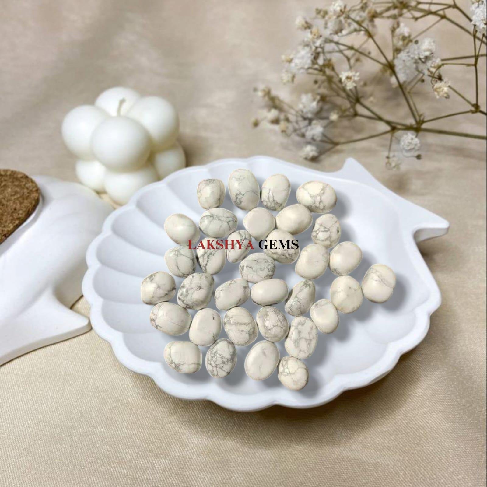 Polished white Howlite tumble stones with natural grey veining for calming energy from lakshya gems mumbai