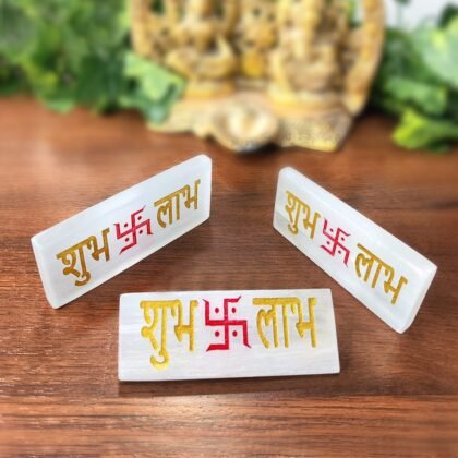Hand-carved Selenite Shub Labh plates with a silky white glow for home prosperity.