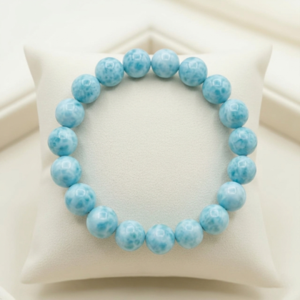 Rare natural Larimar beaded bracelet featuring soft sky-blue colors and white volcanic marbling From Lakshya Gems