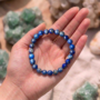 Deep blue natural Lapis Lazuli beaded bracelet featuring golden Pyrite flecks and a high-polish finish Lapis Lazuli Bracelet Lakshya Gems