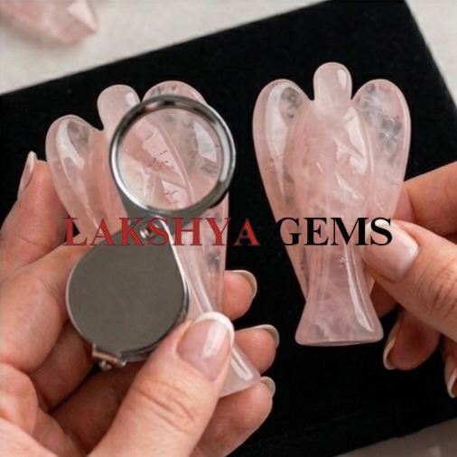 Rose quartz crystal angel from lakshya gems Mumbai A hand-carved natural Rose Quartz crystal angel featuring soft pink hues and a smooth polished finish.