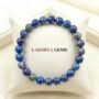 Natural Lapis Lazuli beaded bracelet featuring deep indigo blue stones with golden pyrite flecks.