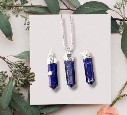 Natural Lapis Lazuli pencil pendant with deep blue color and golden pyrite inclusions.