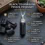 Natural Black Tourmaline pencil pendant with a deep jet-black luster and silver-toned bail.