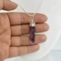 lakshya gems Genuine Amethyst pencil pendant featuring deep purple hues and a decorative silver bail.