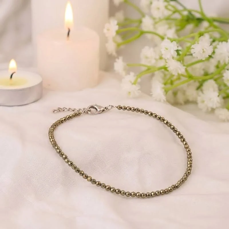 Handcrafted Pyrite beaded anklet with metallic gold shine for wealth and protection.